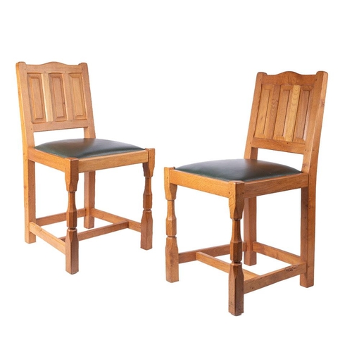 134 - Colin Beaverman Almack: a pair of oak dining chairs, upholstered seats, carved squirrel decoration t... 