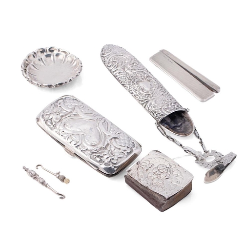 299 - A group of silver items comprising a Victorian spectacles case with chatalaine belt clip and fob, a ... 