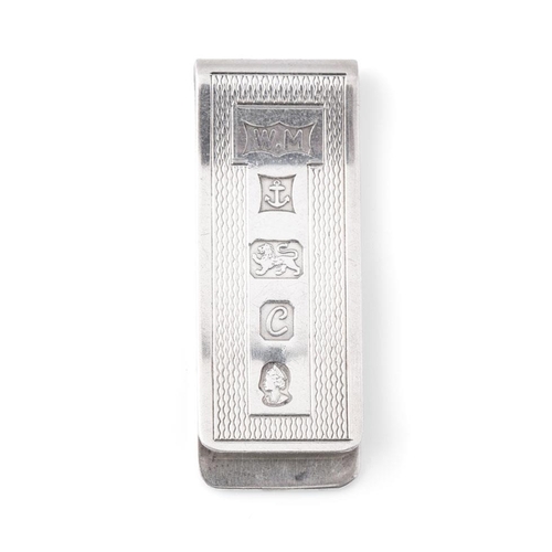 307 - Hallmarked silver money clip, engineered decoration, 16.6g, Birmingham 1977.