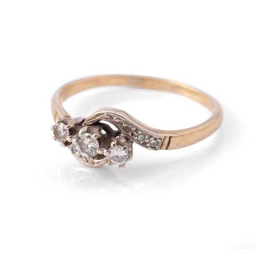 325 - A 9ct gold and diamond crossover ring, size L, 1.8g.