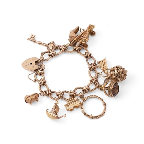 339 - A 9ct gold charm bracelet, the oval links with textured twist and having heart shaped padlock clasp,... 