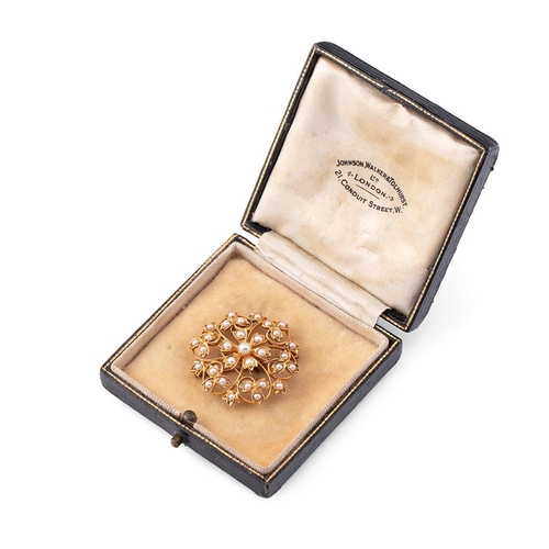 369 - Yellow metal (tests as 15ct gold) floral brooch, set seed pearls, with safety chain, 5.9g, in period... 