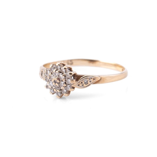 370 - 9ct gold flower head ring, set diamonds, Size N, 1.3g.