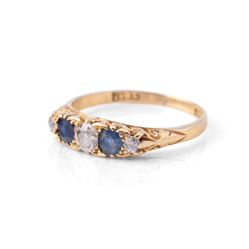 372 - 18ct diamond and sapphire five stone ring, central stone approx 0.125ct, size K, 2.3g.