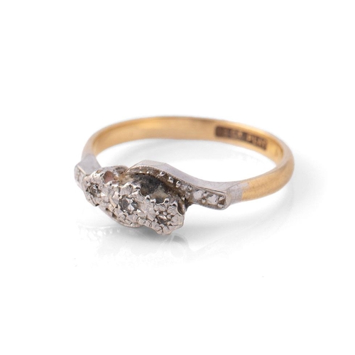 398 - 18ct yellow gold and platinum three stone diamond ring. Ring size M. Weight 2.7g.