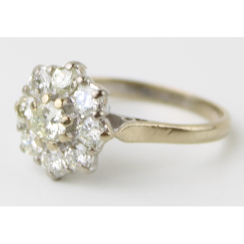 316 - Diamond cluster ring, claw set central round-cut brilliant diamond, within border of eight further d... 