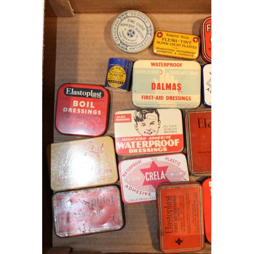 103 - A collection of advertising tins relating to first aid to include plaster tins, band - aids and othe... 