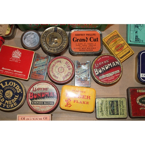 107 - A collection of advertising tins and packaging relating to tobacco, to include brands 'Lloyds Bondma... 