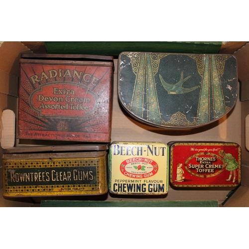 109 - A collection of large advertising tins and packaging, to include brands 'Beech - Nut', Thorne's' and... 