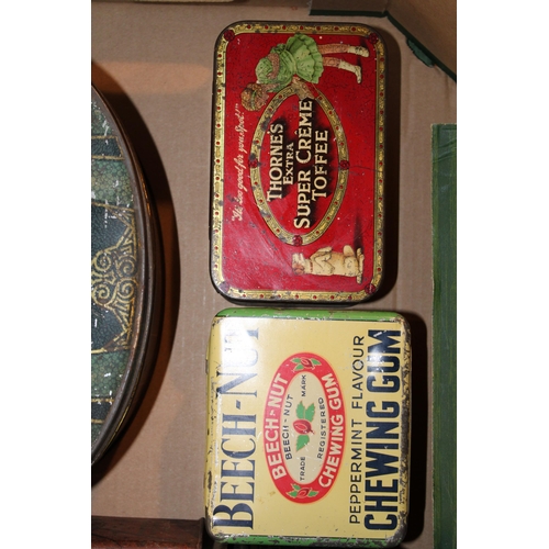 109 - A collection of large advertising tins and packaging, to include brands 'Beech - Nut', Thorne's' and... 