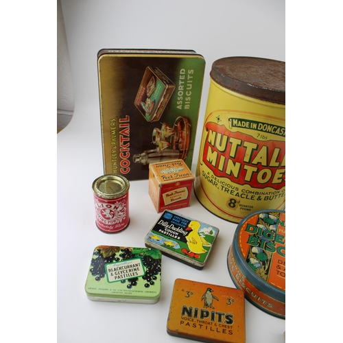 114 - A good collection of vintage advertising tins to include 'Smith's Potato Crisps', 'Nipits' a 'Voltas... 