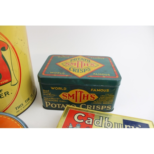 114 - A good collection of vintage advertising tins to include 'Smith's Potato Crisps', 'Nipits' a 'Voltas... 