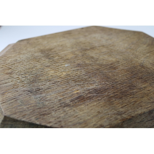 122 - Robert 'Mouseman' Thompson bread board, carved mouse to side, 30.5cm x 26cm.