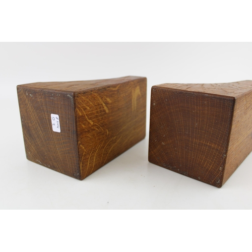 128 - Robert 'Mouseman' Thompson pair of oak bookends, carved mouse decoration to each, 15cm tall (2).