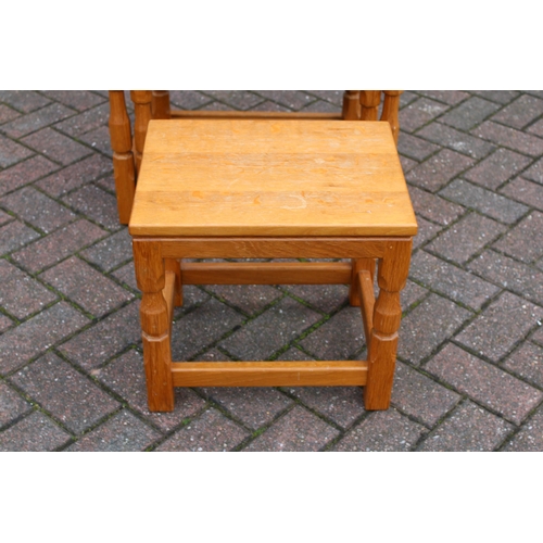 129 - Knightman Family: An Old Mill Furniture (Balk): An Oak Nest of Three Tables, dimpled tops, on four o... 