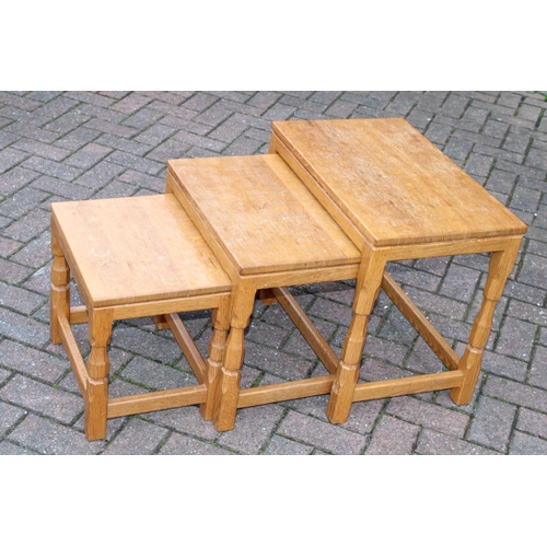 129 - Knightman Family: An Old Mill Furniture (Balk): An Oak Nest of Three Tables, dimpled tops, on four o... 