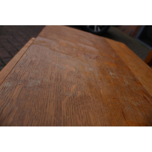 129 - Knightman Family: An Old Mill Furniture (Balk): An Oak Nest of Three Tables, dimpled tops, on four o... 