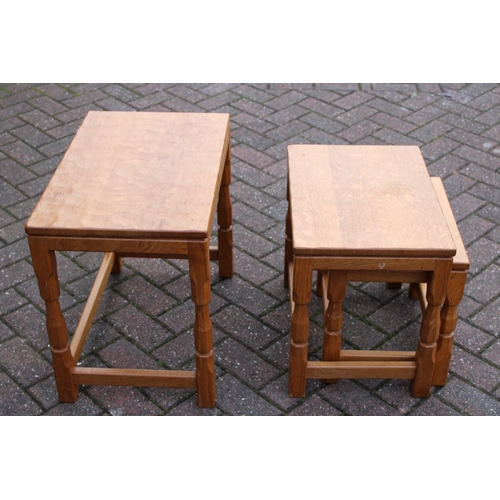 129 - Knightman Family: An Old Mill Furniture (Balk): An Oak Nest of Three Tables, dimpled tops, on four o... 