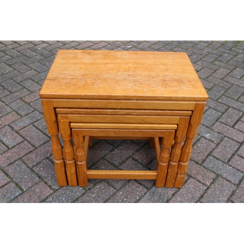 129 - Knightman Family: An Old Mill Furniture (Balk): An Oak Nest of Three Tables, dimpled tops, on four o... 