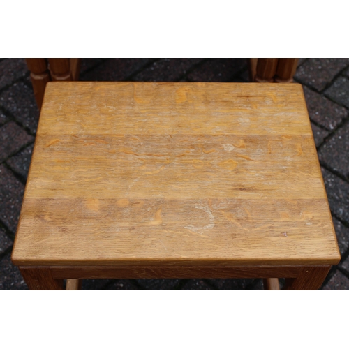 129 - Knightman Family: An Old Mill Furniture (Balk): An Oak Nest of Three Tables, dimpled tops, on four o... 