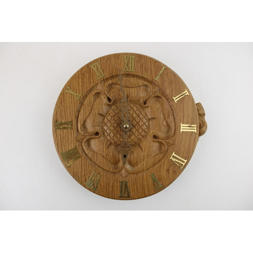 133 - Colin Beaverman Almack: a carved oak 'Yorkshire Rose' wall clock, circular, beaver positioned at 3pm... 