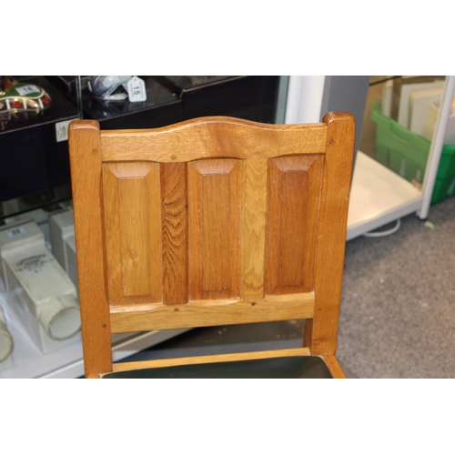 134 - Colin Beaverman Almack: a pair of oak dining chairs, upholstered seats, carved squirrel decoration t... 