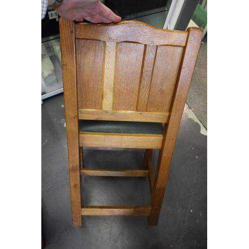 134 - Colin Beaverman Almack: a pair of oak dining chairs, upholstered seats, carved squirrel decoration t... 