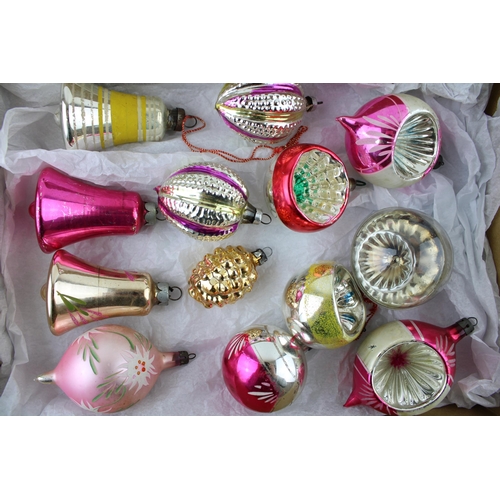 145 - A box of vintage christmas decorations to include mercury glass baubles.