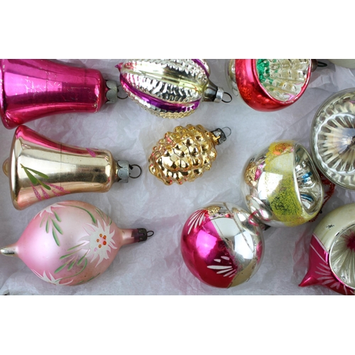 145 - A box of vintage christmas decorations to include mercury glass baubles.