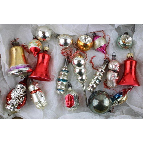 146 - A box of vintage christmas decorations to include mercury glass baubles.