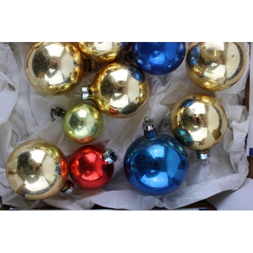 147 - A box of vintage christmas decorations to include glass baubles.