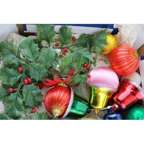 148 - A box of vintage Christmas decorations to include glass baubles, satin baubles and plastic ivy.