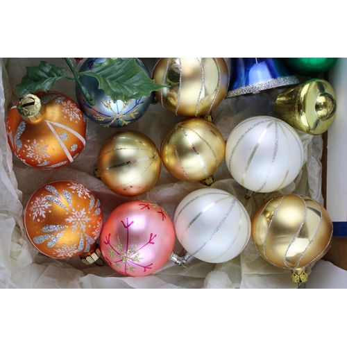 148 - A box of vintage Christmas decorations to include glass baubles, satin baubles and plastic ivy.