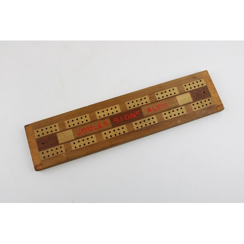 15 - Joules Stone Ales cribbage board, 31cm long.