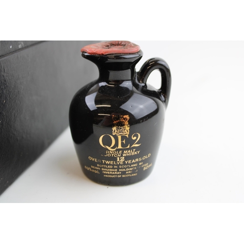 154 - A boxed bottle of QE2 Single Malt Scotch Whiskey. 12 years old. 48.6% Vol. 75cl. together with anoth... 