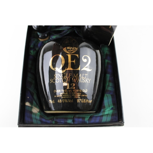 154 - A boxed bottle of QE2 Single Malt Scotch Whiskey. 12 years old. 48.6% Vol. 75cl. together with anoth... 