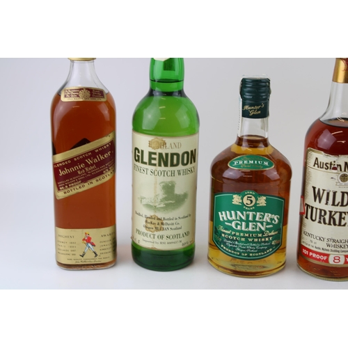 157 - A collection of bottled Bourbon and Blended Whisky to include Johnnie Walker Red Label, Highland Bes... 