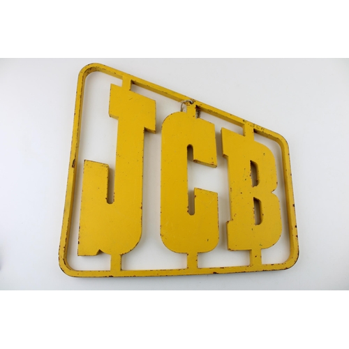 16 - A heavy and large iron advertising sign 'JCB', plasma cut, in yellow paint, 38.5cm wide, from a loca... 