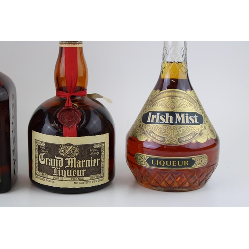 162 - A collection of bottled liqueurs to include Cointreau, Grand Marnier, Drambuie and Irish Mist (4), l... 