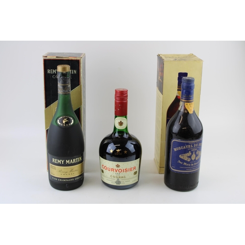 165 - A collection of Bottled Brandy to include Remy Martin & Courvoisier Cognac with a bottle of Moscatel... 