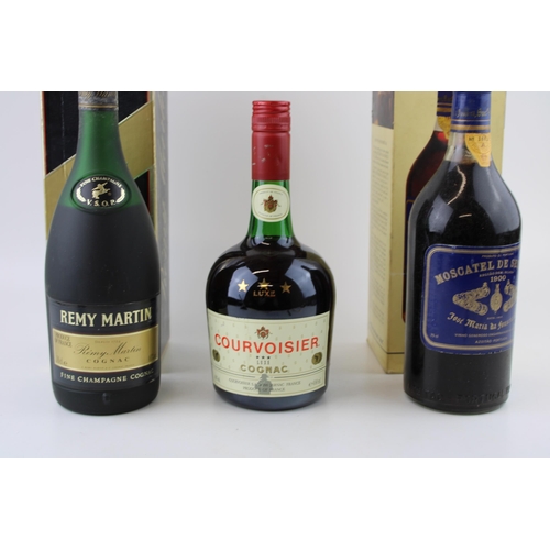 165 - A collection of Bottled Brandy to include Remy Martin & Courvoisier Cognac with a bottle of Moscatel... 