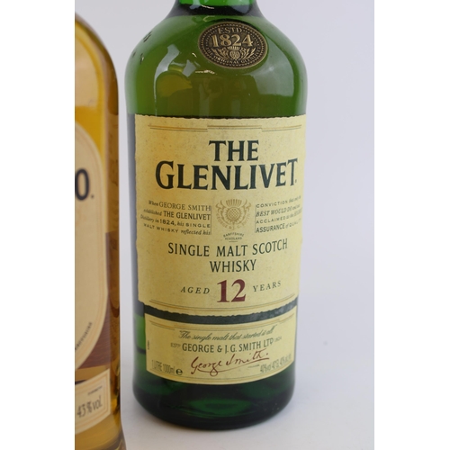 183 - A bottle of Knockando 12 year old single malt whisky 70cl distilled in 1999 with a Glenlivet 12 year... 