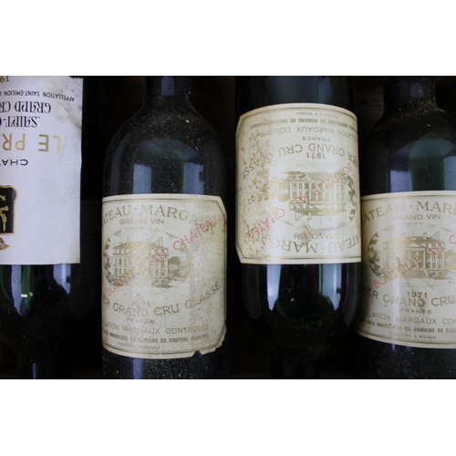 190 - A collection of vintage French wines in a wooden case to include five bottles of Chateau Margaux 197... 