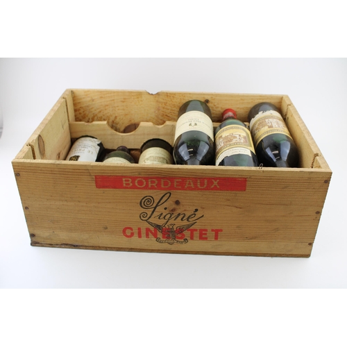 190 - A collection of vintage French wines in a wooden case to include five bottles of Chateau Margaux 197... 