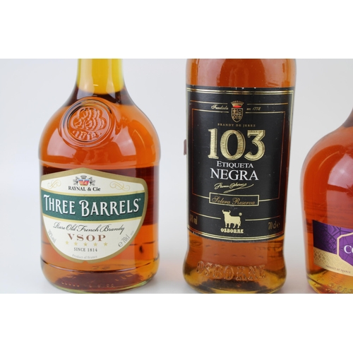 205 - A bottle of Courvoisiier V.S Cognac 70cl together with two bottles of Raynal & Cie Three Barrels Bra... 