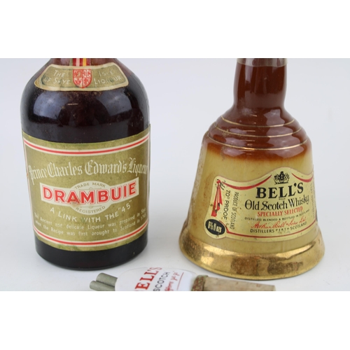 210 - A 11 5/6 FL. Ozs Drambuie 70 percent proof together with a Bell's 70 percent proof 6 2/3 fl ozs and ... 