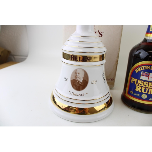 211 - A 70cl Pusser's Rum 54.5% proof, a 70cl Bell's Scotch Whiskey 40% vol together with a Tokaji Aszu. (... 