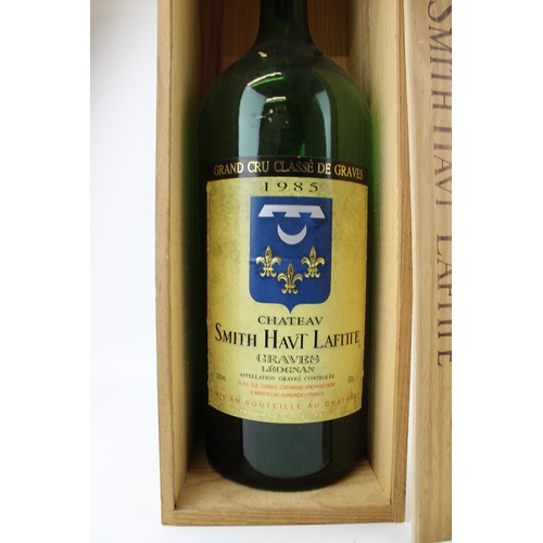 218 - Chateau Smith Haut Lafite glass bottle, in wooden display box, 12.5% vol, 600cl, 53cm tall.