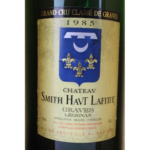 218 - Chateau Smith Haut Lafite glass bottle, in wooden display box, 12.5% vol, 600cl, 53cm tall.