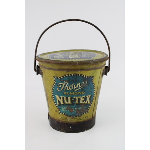 24 - Confectionary tin / pale advertising 'Thorne's Almond Nu-Tex'. Height 16cm.